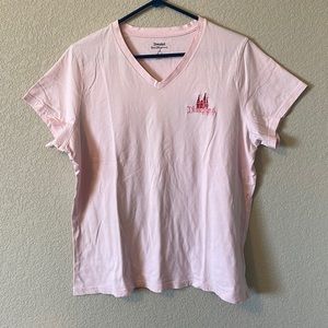 Disneyland resort t-short in light pink with castle embroidery.